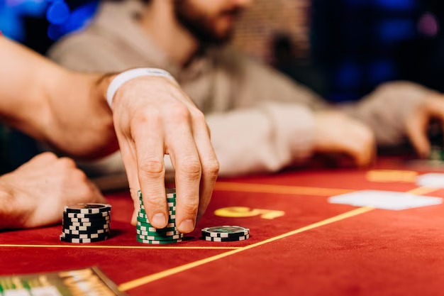 Live dealer roulette table on newbie mobile app showing betting interface and live stream